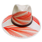 white hat with red palm frond designs and a brown leather band.