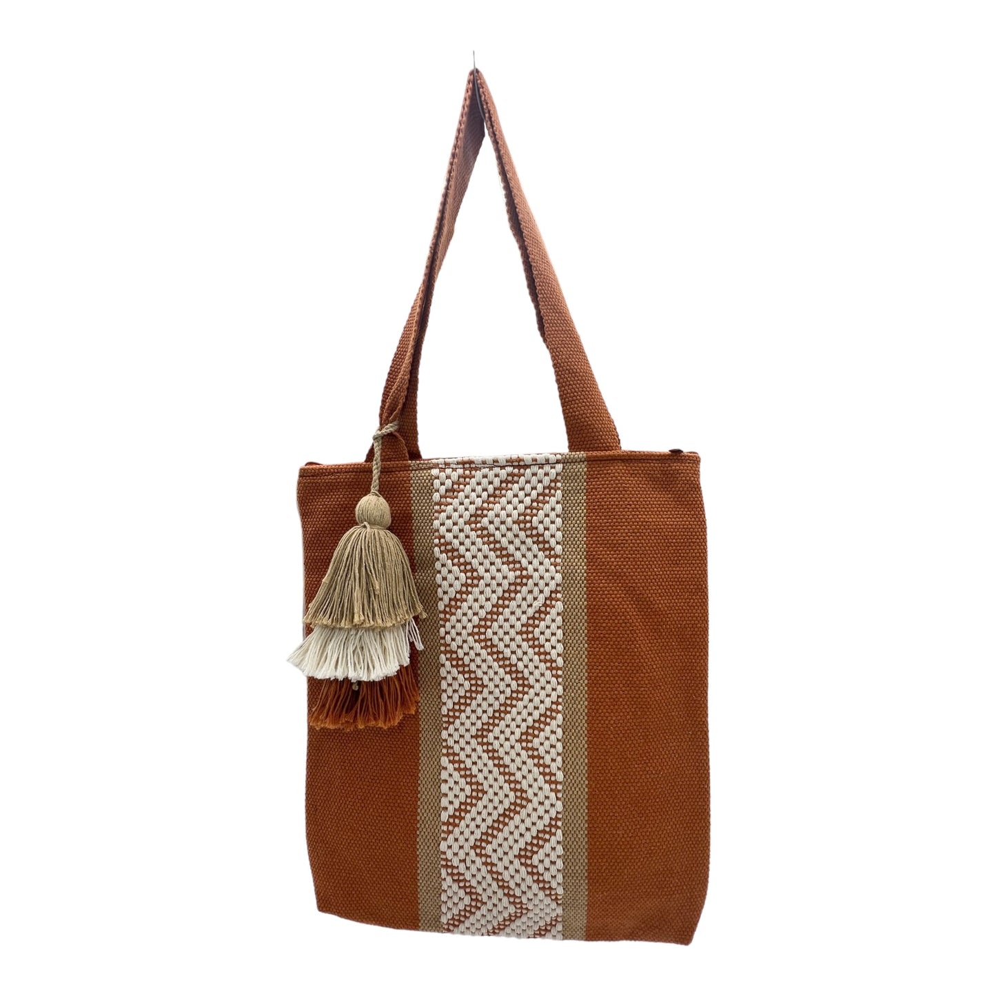 tote bag with a burnt orange color and a central white zigzag woven design, featuring a layered tassel