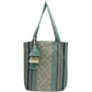 light teal tote bag with vertical stripes in various colors and a central band of geometric woven patterns. It features a matching tassel