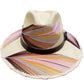 beige hat with multicolored palm frond designs in shades of brown, orange, pink, and purple, and a brown leather band.