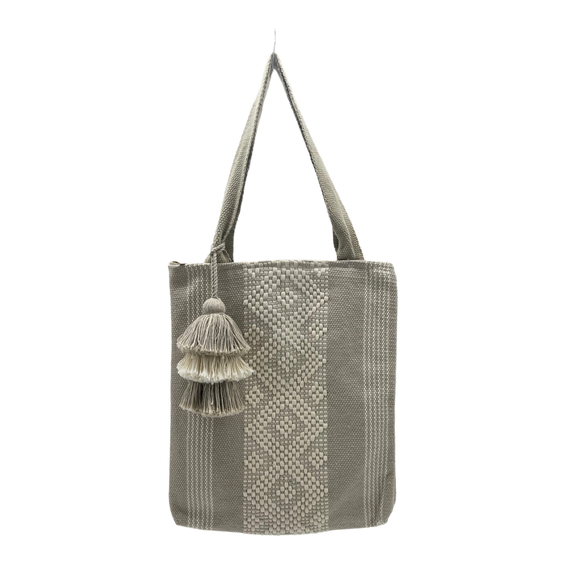 beige tote bag with intricate woven patterns and vertical stripes, adorned with a layered and tassel