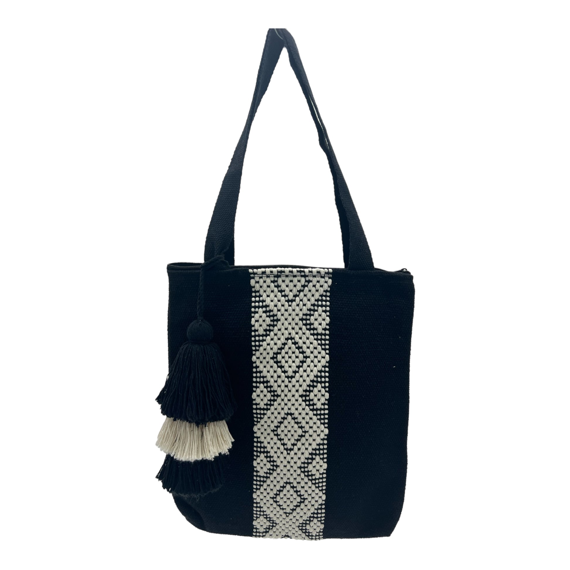 black tote bag with a white, geometric woven pattern down the center and a matching tassel