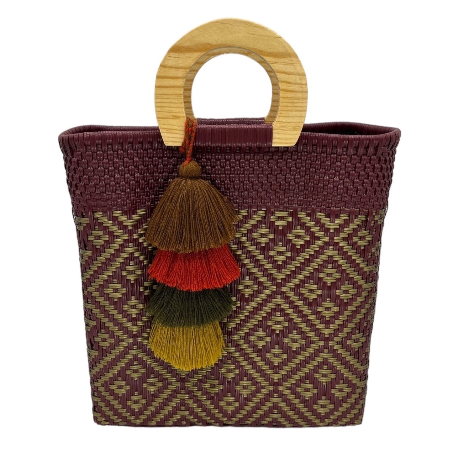 maroon woven tote bag made of recycled plastic with a wooden circular handle. The bag features a geometric pattern in green and is adorned with a coordinating pompon