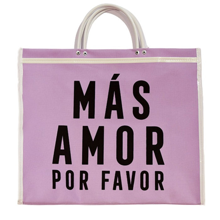 pink tote bag with white handles and "MÁS AMOR POR FAVOR" in large black letters