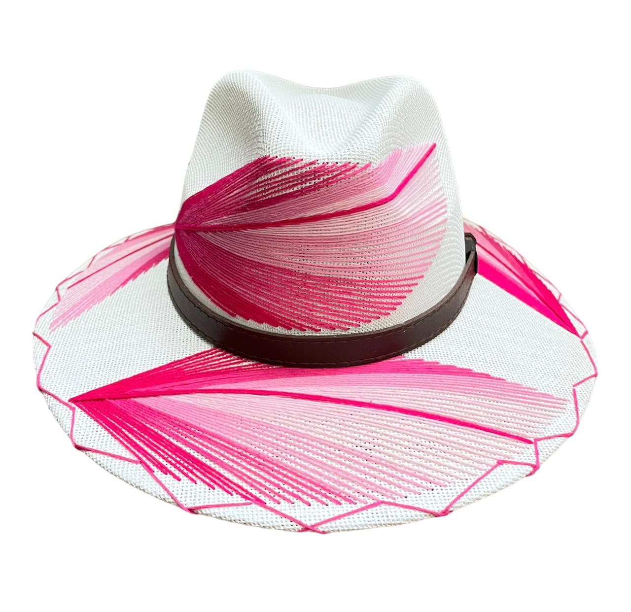 white hat with pink and magenta palm frond designs and a brown leather band.