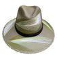 khaki hat with green and white palm frond designs and a black leather band.