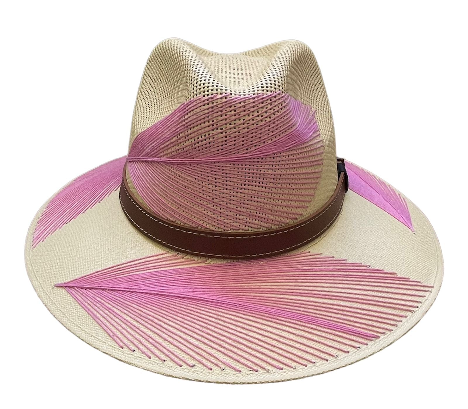 tan hat featuring pink palm frond designs and a brown leather band.