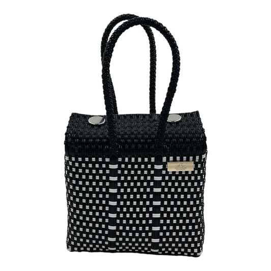 stylish handwoven tote bag with a black and white checkerboard pattern. It features two sturdy black handles and is rectangular in shape.