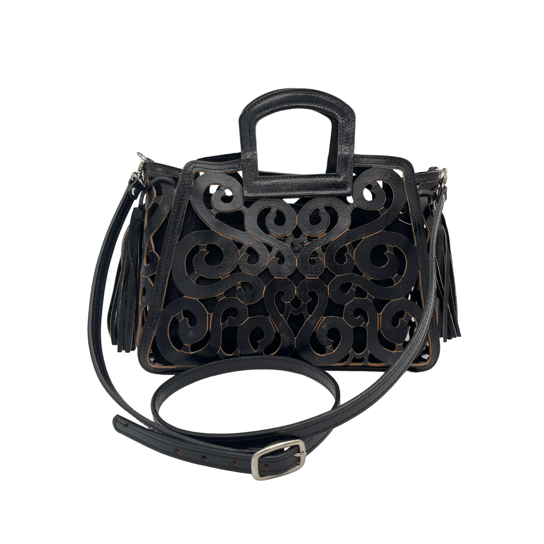 Musical Notes Crossbody - Distressed Black leather tote with an intricate scroll pattern, handle, adjustable shoulder strap, and side tassels.