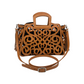 Musical Notes Crossbody - Honey leather tote with an intricate scroll pattern, handle, shoulder strap, and side tassels.