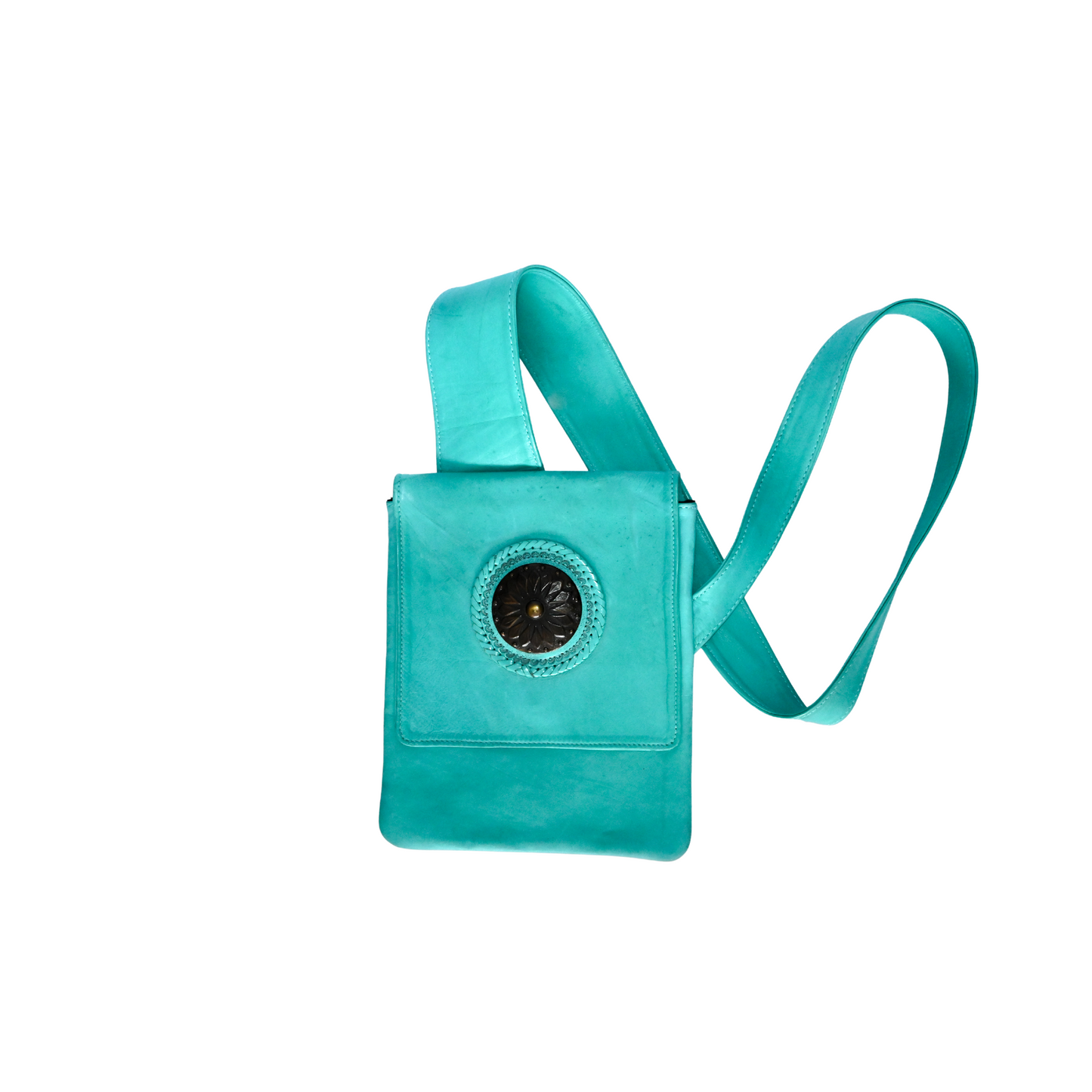 turquoise leather crossbody bag with a wide strap and a circular decorative medallion on the front flap.