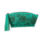 turquoise leather cosmetic bag with detailed hand-tooled floral patterns on both sides. It features braided seams, a full zipper top, a sueded interior, and a decorative tassel.