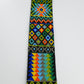 Close-up view of a colorful beaded strap with intricate traditional patterns, showcasing vibrant geometric designs and detailed craftsmanship.