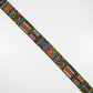 Close-up view of a colorful beaded strap with intricate traditional patterns, showcasing vibrant geometric designs and detailed craftsmanship.