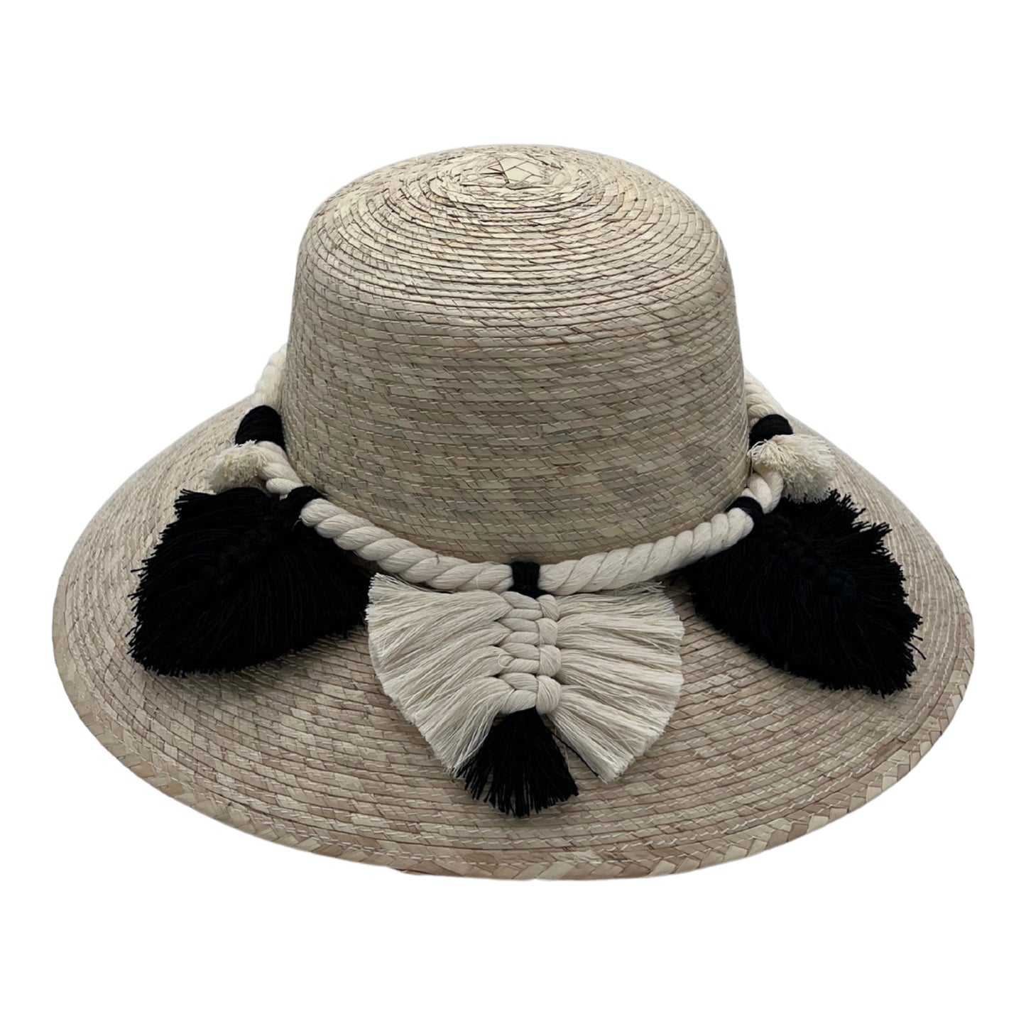 woven straw hat with a wide brim, decorated with black and beige tassels and a braided band around the crown. The hat has a natural straw color.