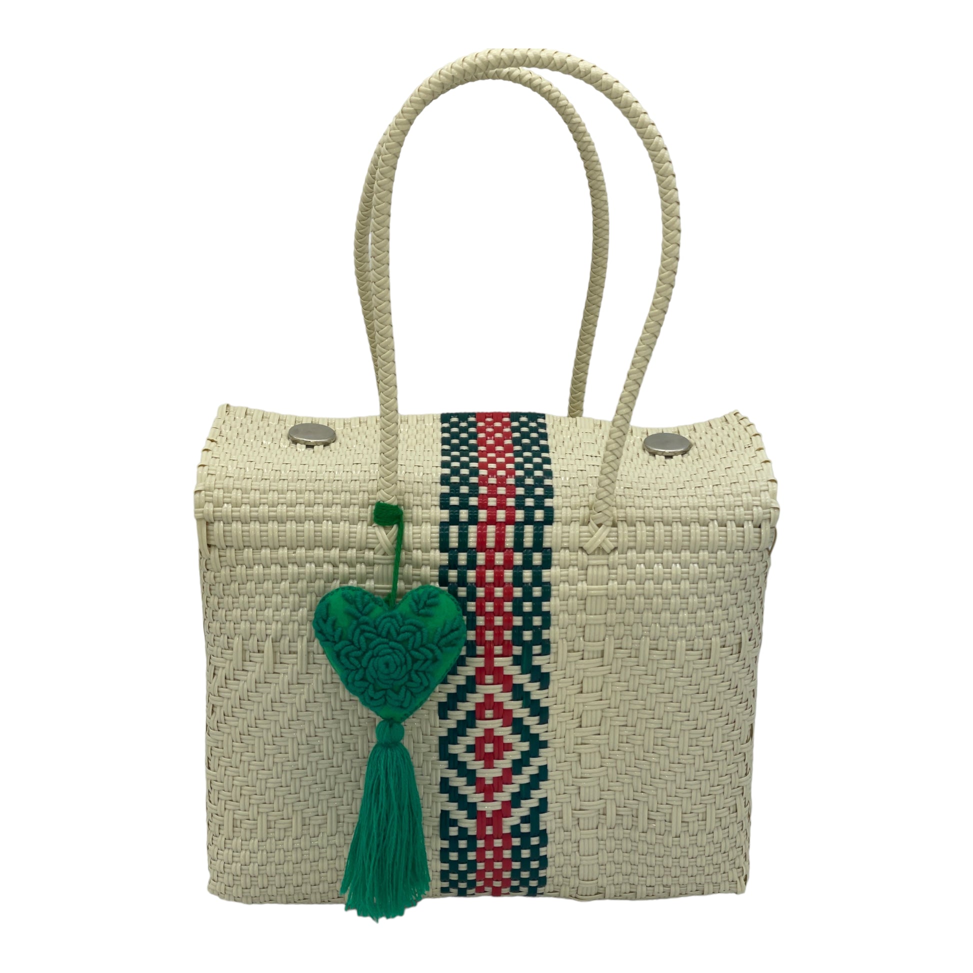 white woven handbag with a vertical red and green geometric pattern, featuring a decorative pompon with a heart.