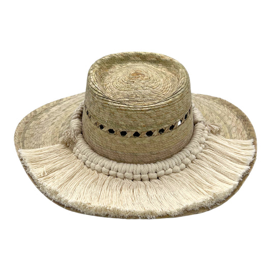 natural straw hat with a flat crown, decorated with a wide band of white tassels around the brim.