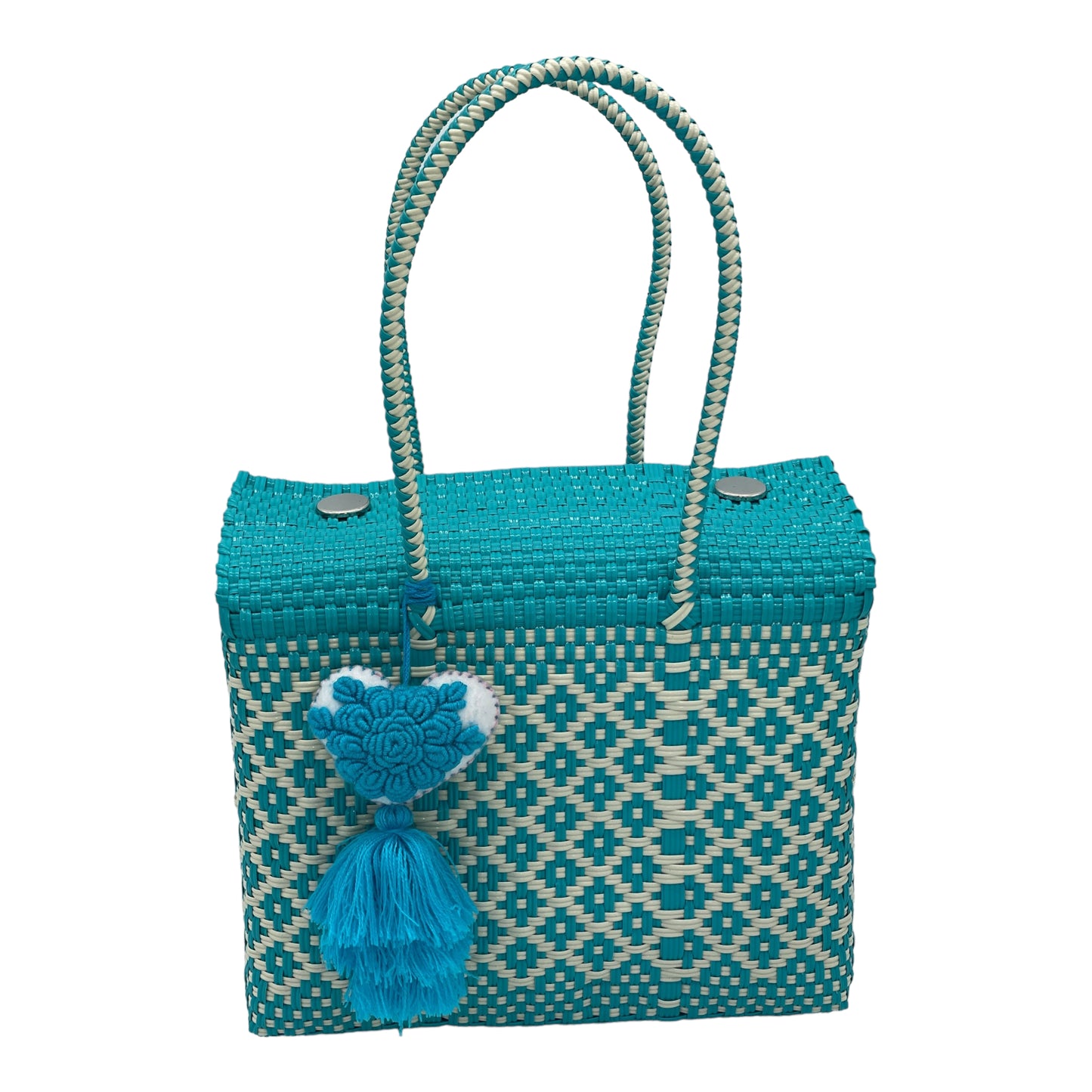 turquoise and beige woven handbag with geometric patterns, featuring a decorative tassel with a heart.