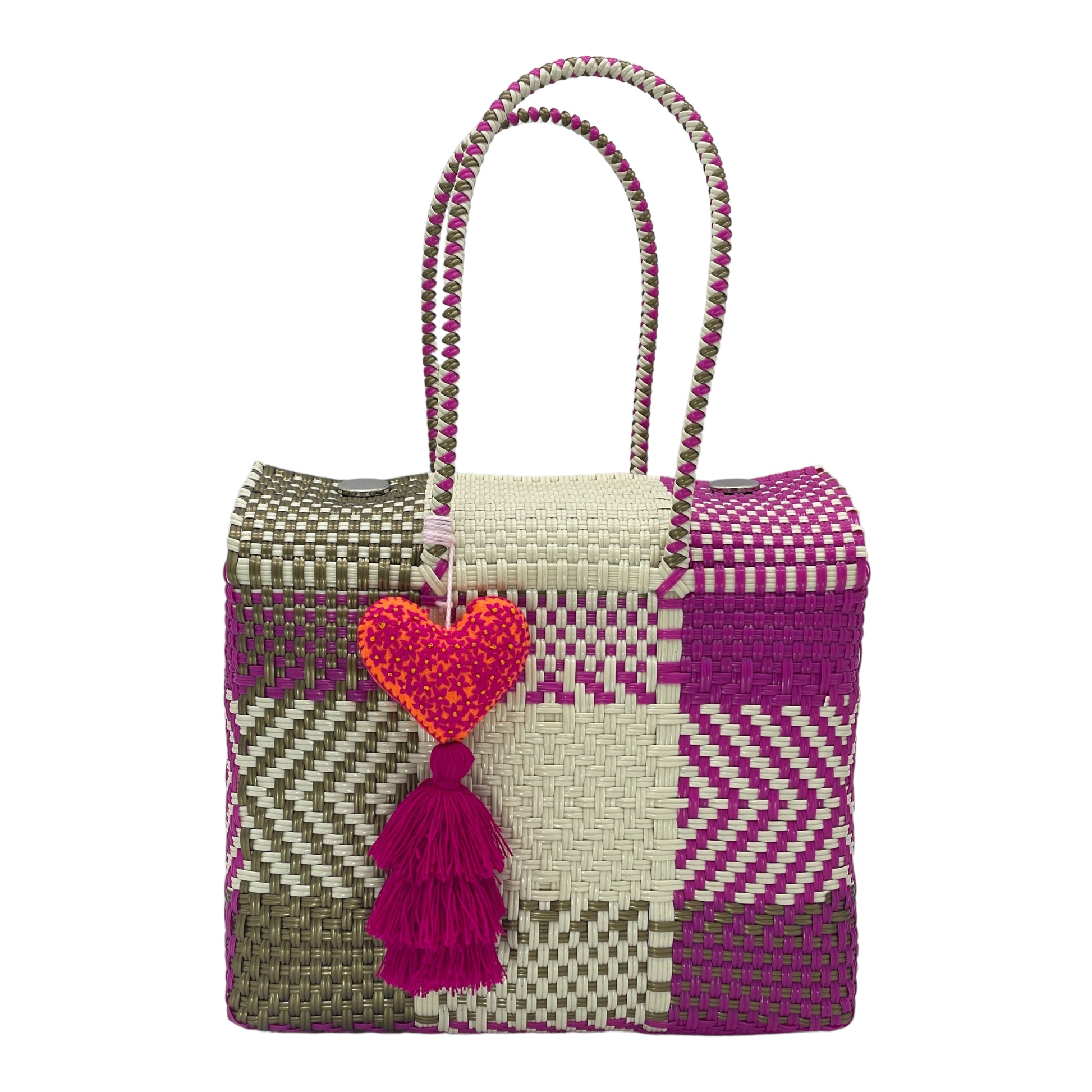 multicolored woven handbag with geometric patterns in purple, tan, and green, featuring a decorative  tassel with a heart.