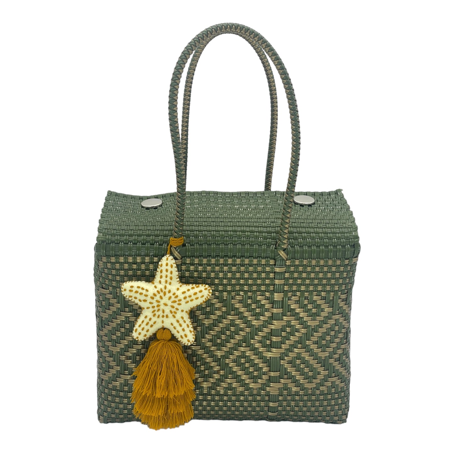 green woven handbag with geometric patterns, featuring a decorative tassel with a star-shaped charm