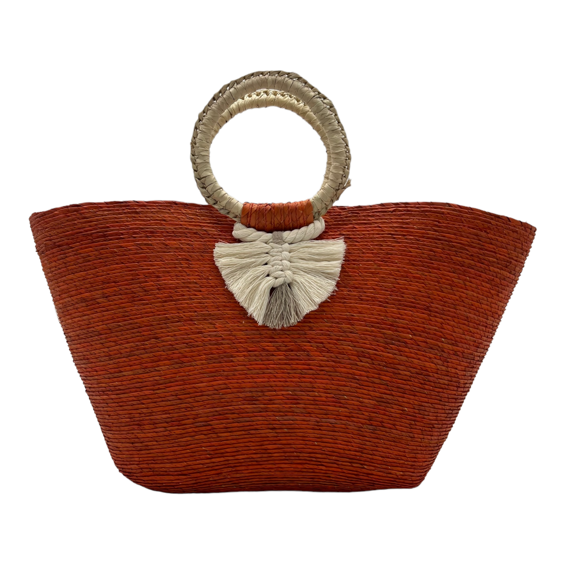 large orange woven tote bag made of palm fibers with a circular handle. The bag features a decorative tassel.