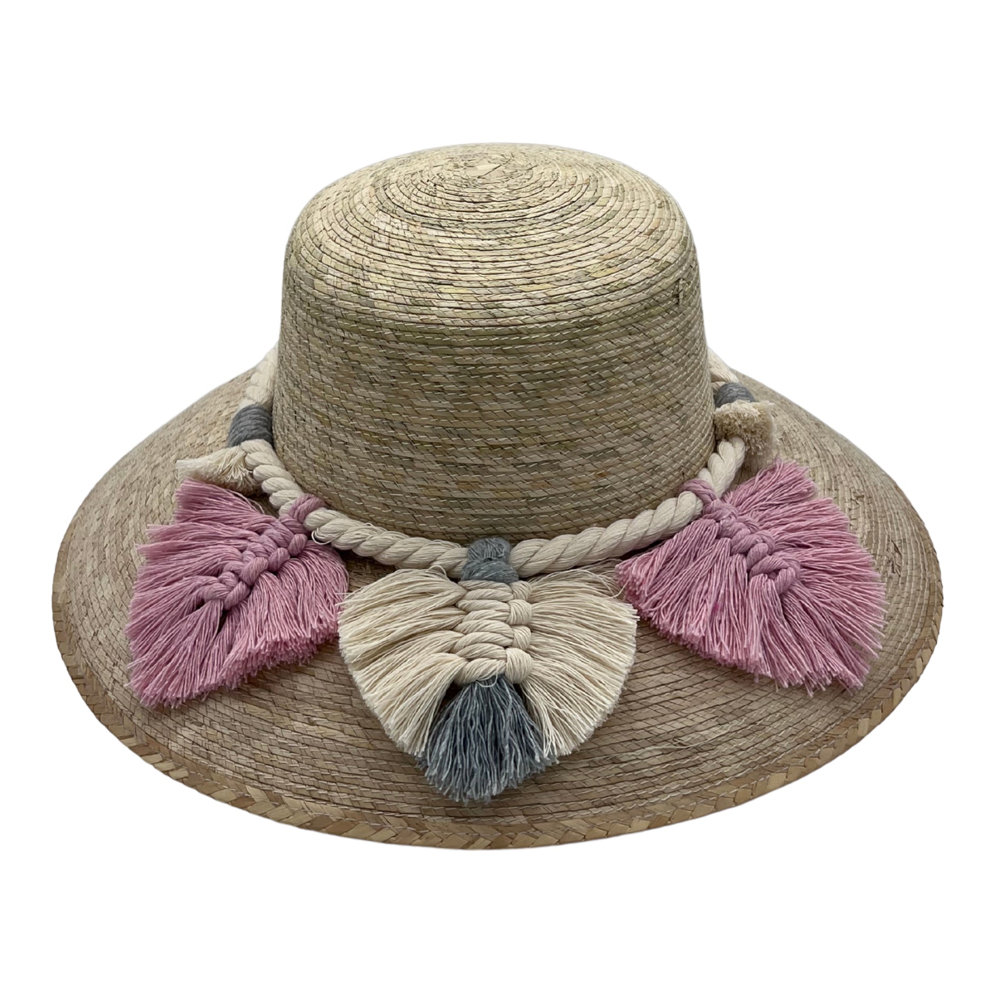 woven straw hat with a wide brim, decorated with pink and beige tassels and a braided band around the crown. The hat has a natural straw color.