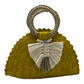 yellow-colored crescent handbag made of palm leaves, featuring a braided white tassel and a woven handle.