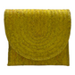 bright yellow woven clutch bag with an intricate, textured pattern and a curved flap closure.